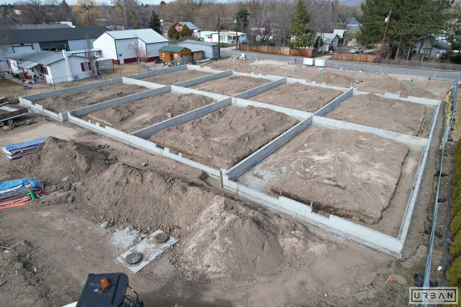 Poured foundation walls across a multi building site