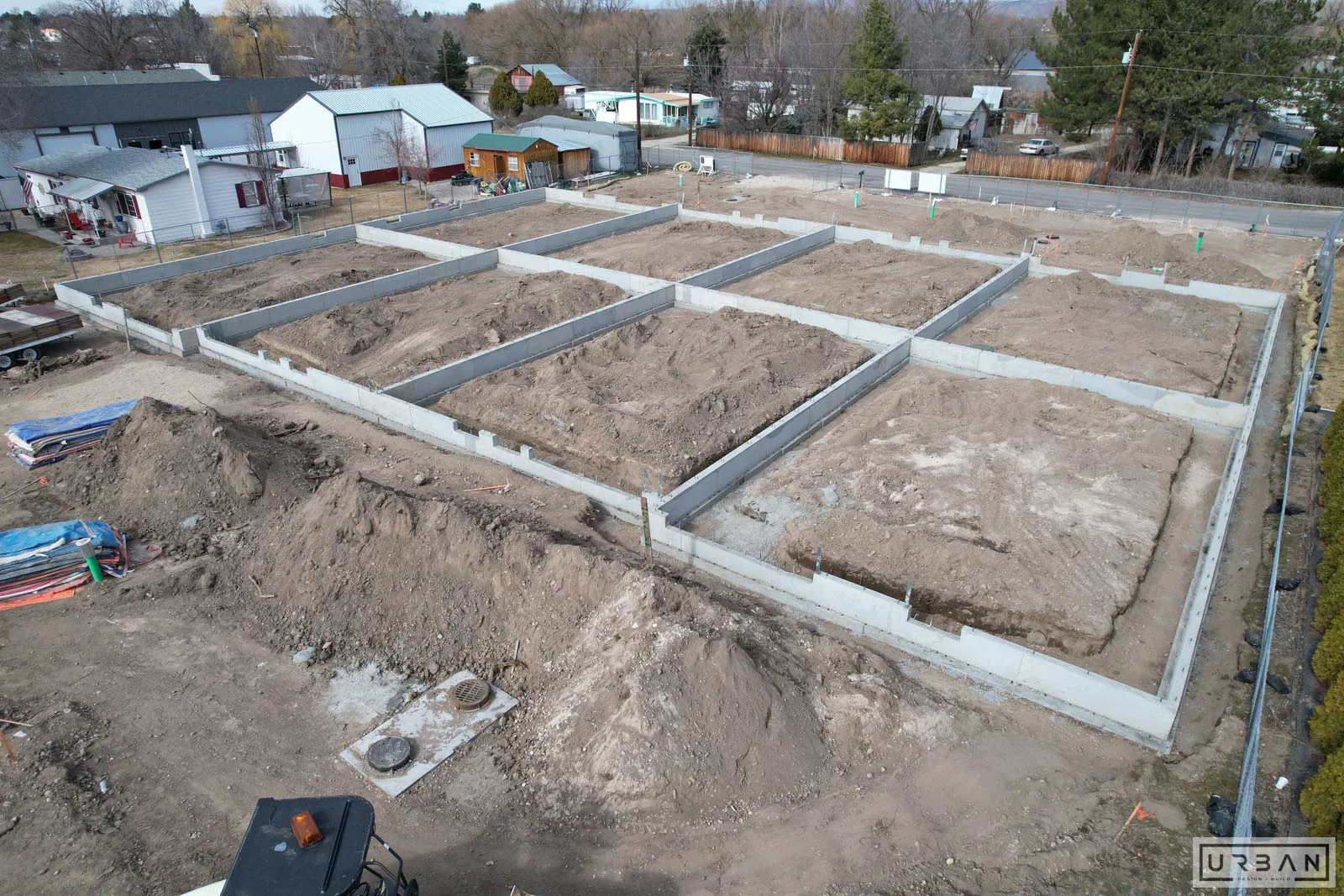 Poured foundation walls across a multi building site