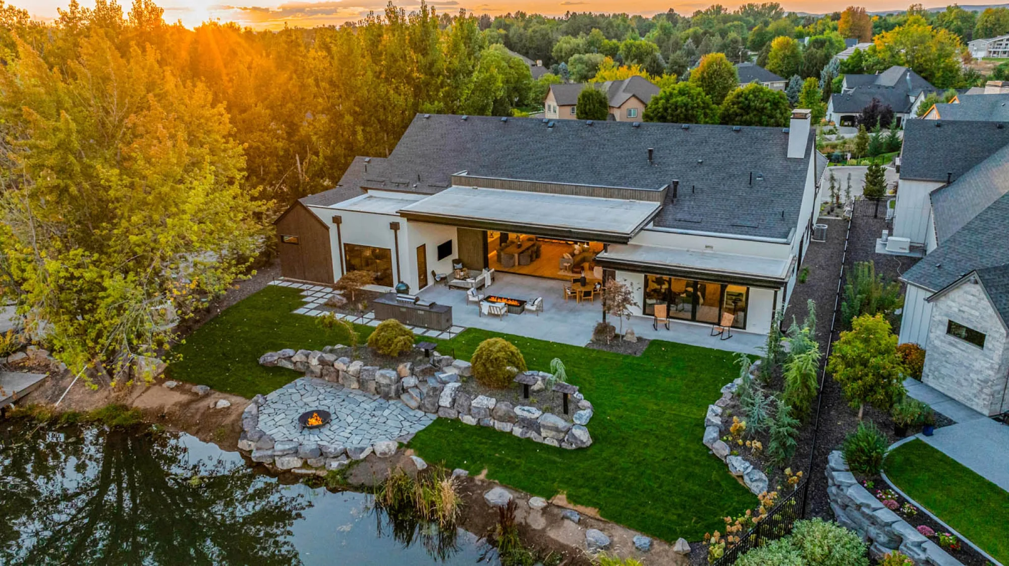 An Urban Design and Build custom home at sunset, seen from above